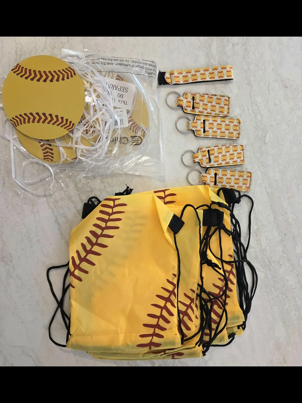 Softball-Themed Drawstring Bags, Paper Softballs & Key Chains -